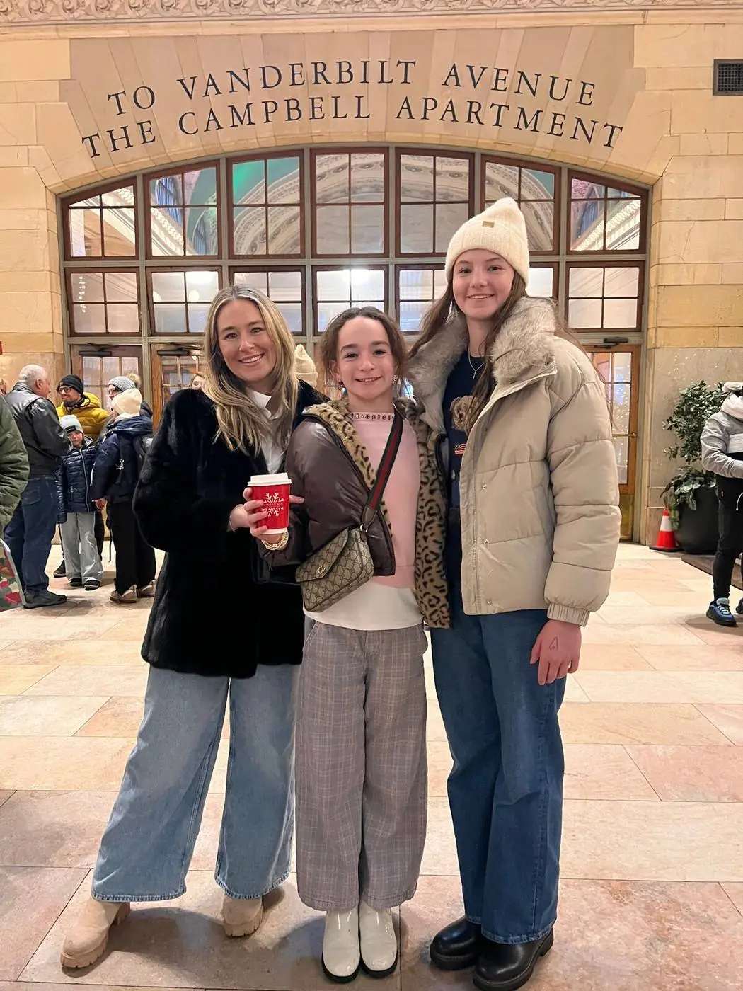 Guests by the Vanderbilt Avenue and Campbell Apartment entrance inside Grand Central