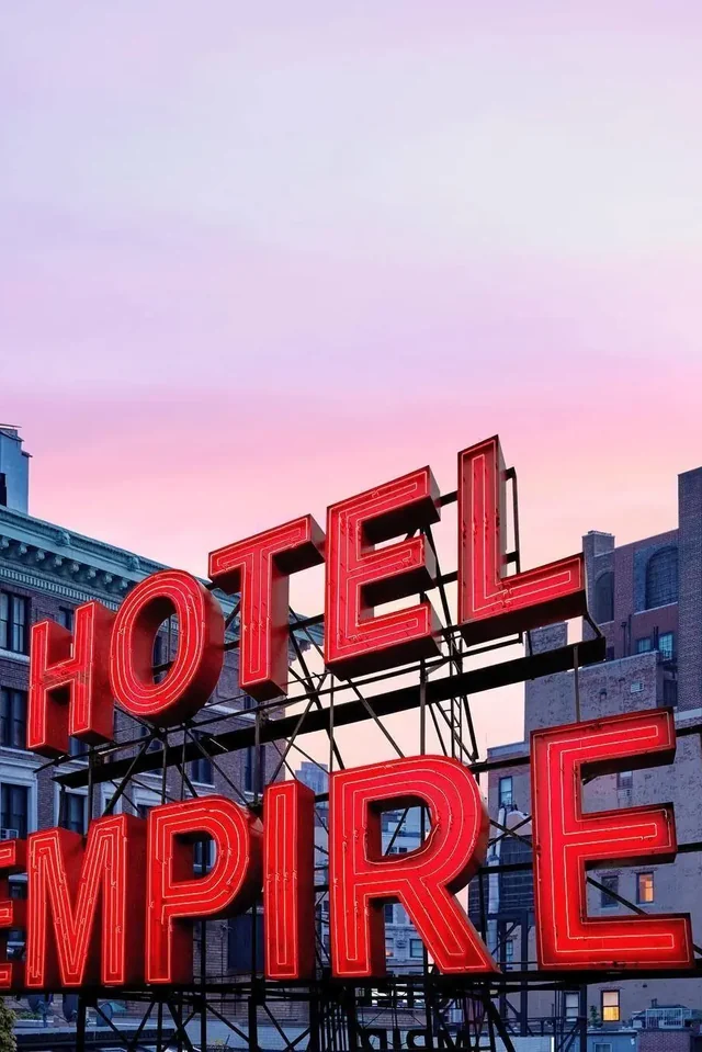 The Empire Hotel neon sign in New York City, a Gossip Girl Tours stop