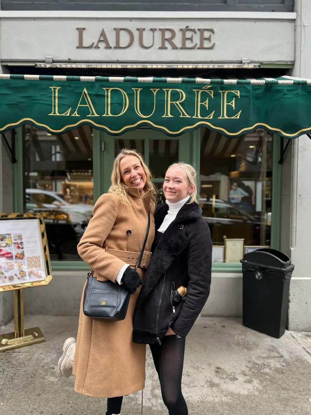 Gossip Girl Tours guests outside the Ladurée patisserie on Madison Avenue, an Upper East Side stop in New York City