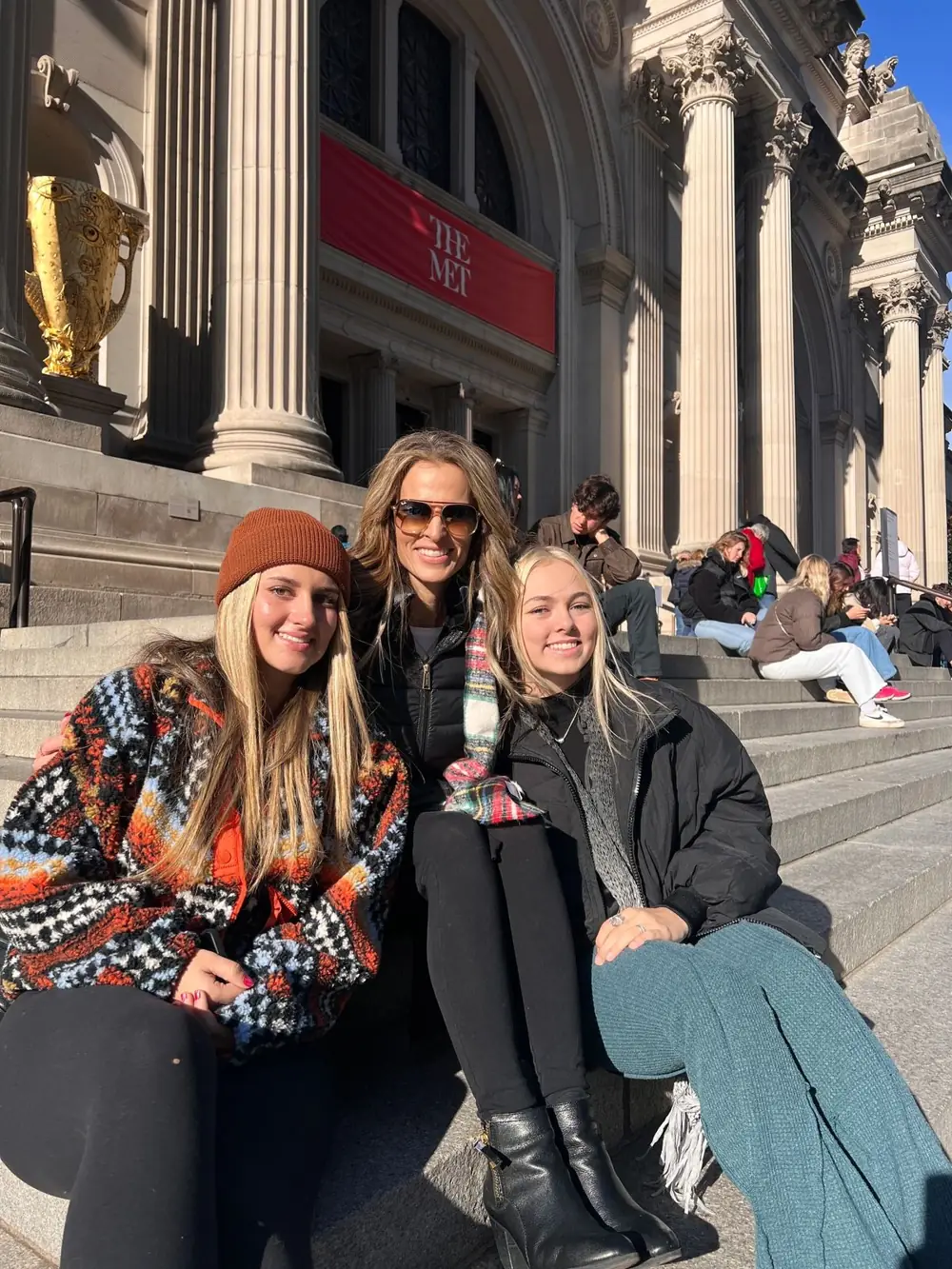 Three guests on the Met Steps filming location during the Gossip Girl Experience NYC