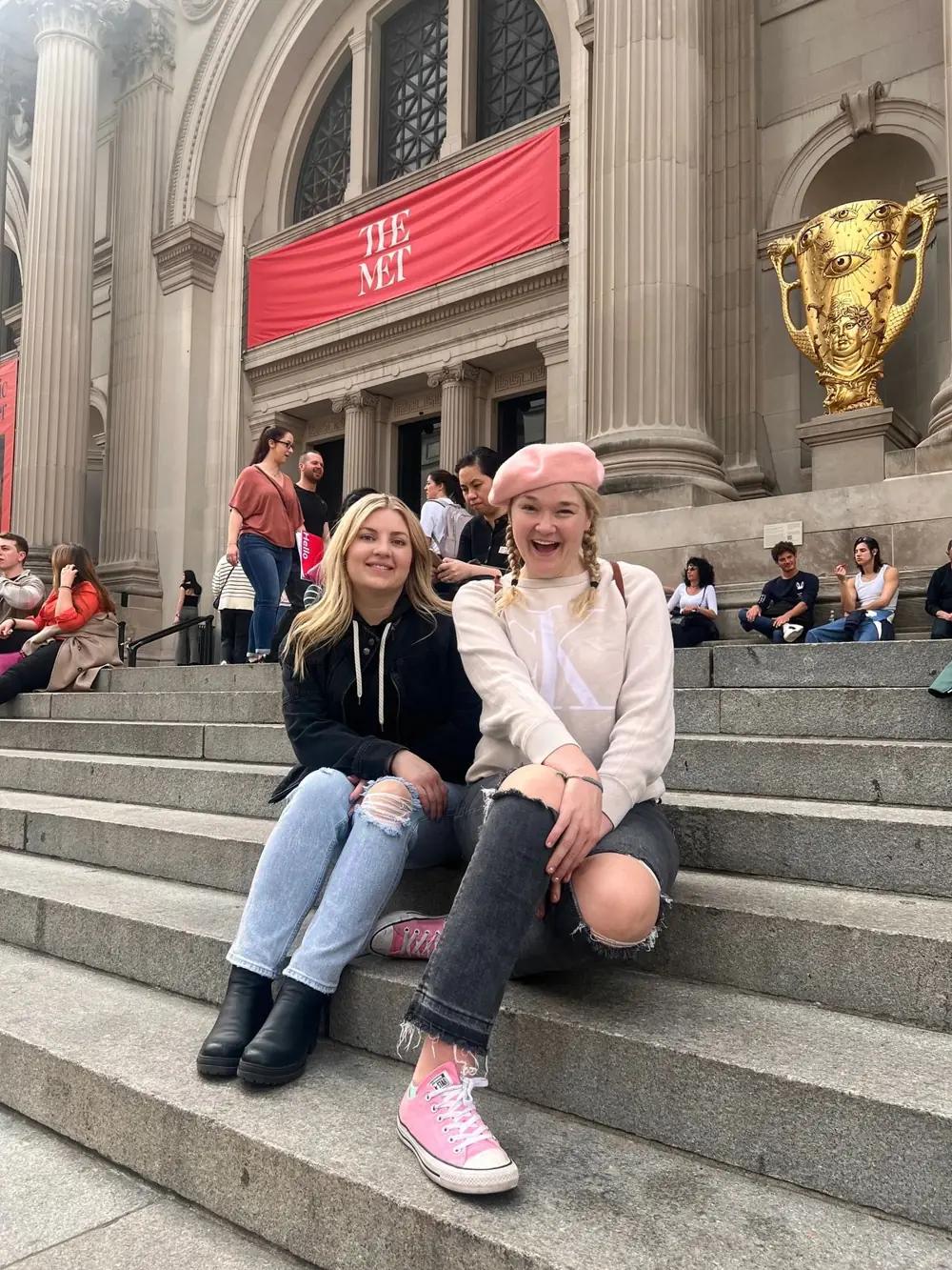 Two guests photographed on Fifth Avenue at the Met Steps on a Gossip Girl Tours route