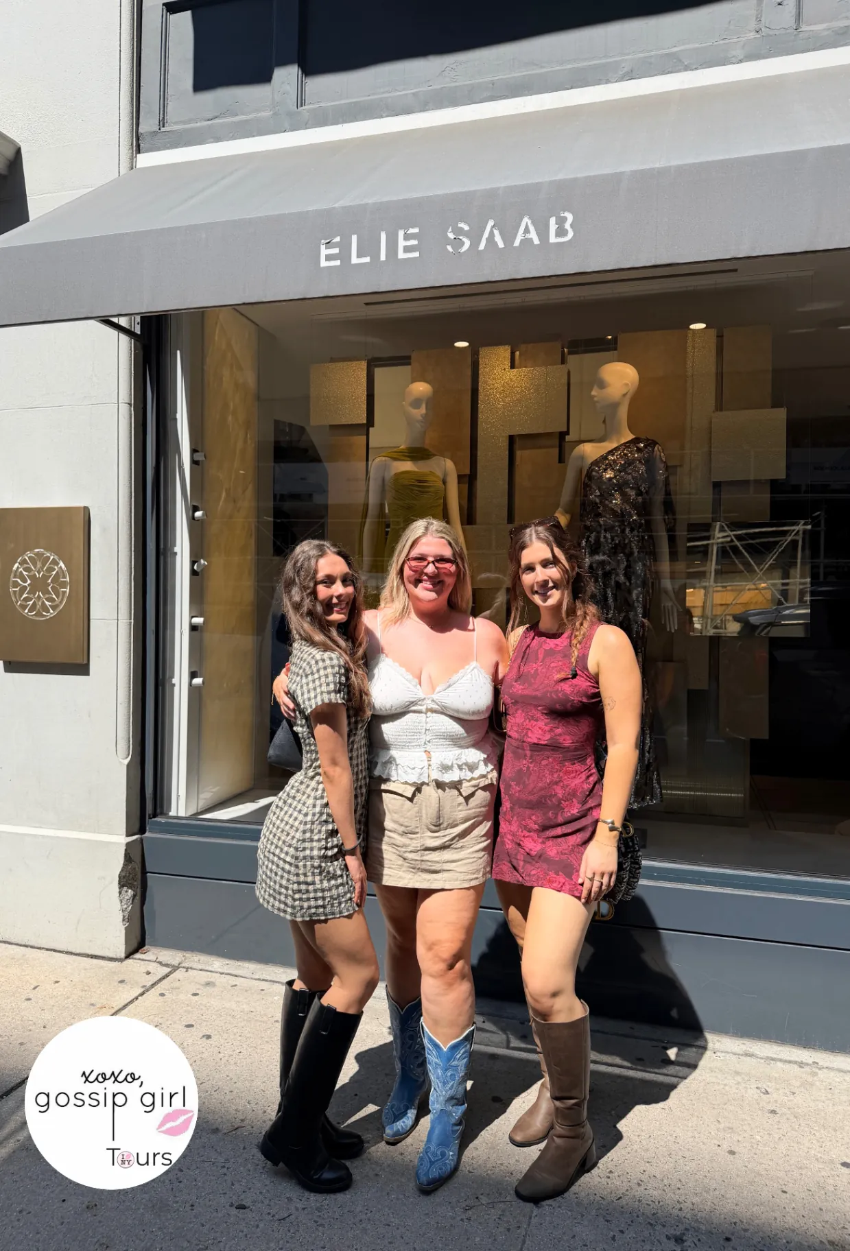 Gossip Girl Tours guests in front of the Elie Saab boutique window on Madison Avenue in New York City